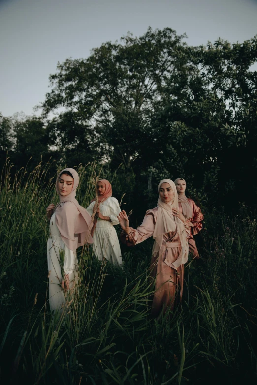 three women are dressed in old - fashioned muslim clothing