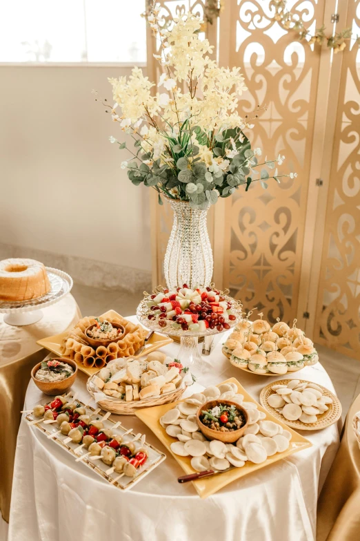 a dining table with food in it