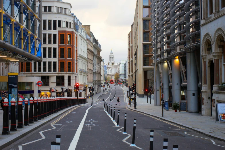 street with a long line of buildings and traffic