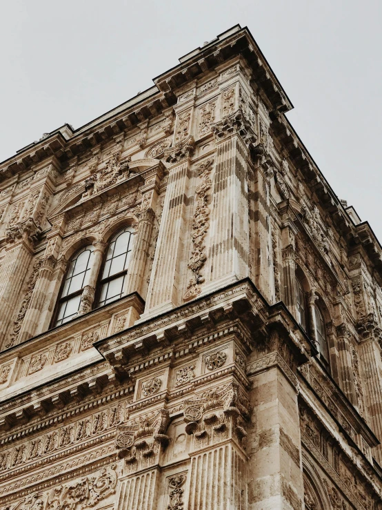 a tall tower with several windows on top