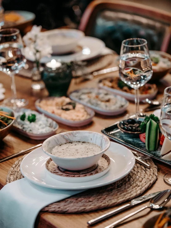 a table full of many plates of food