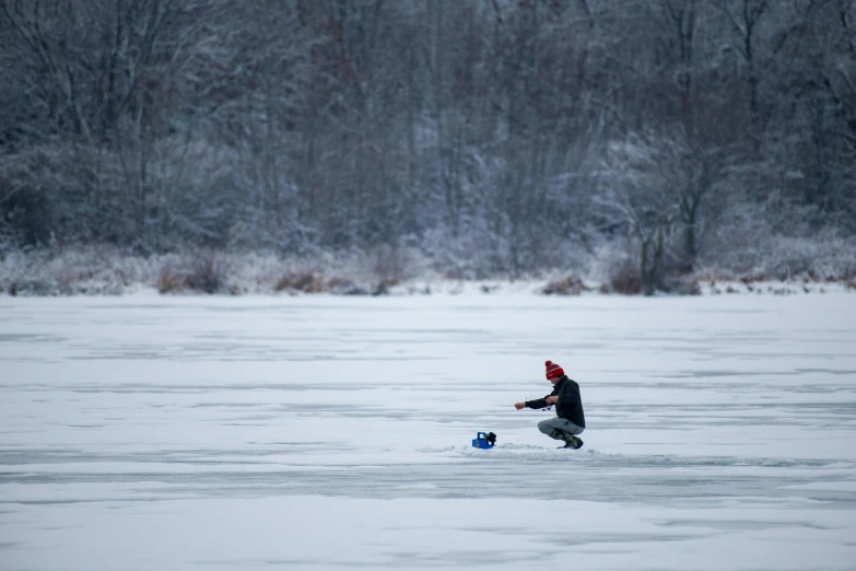 a man with skis is in a lake