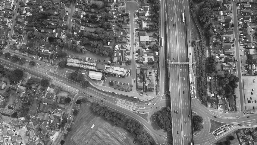 an aerial view of two lanes of traffic