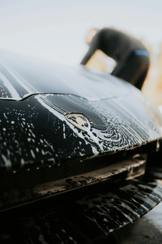 the grill cover is decorated with silver designs