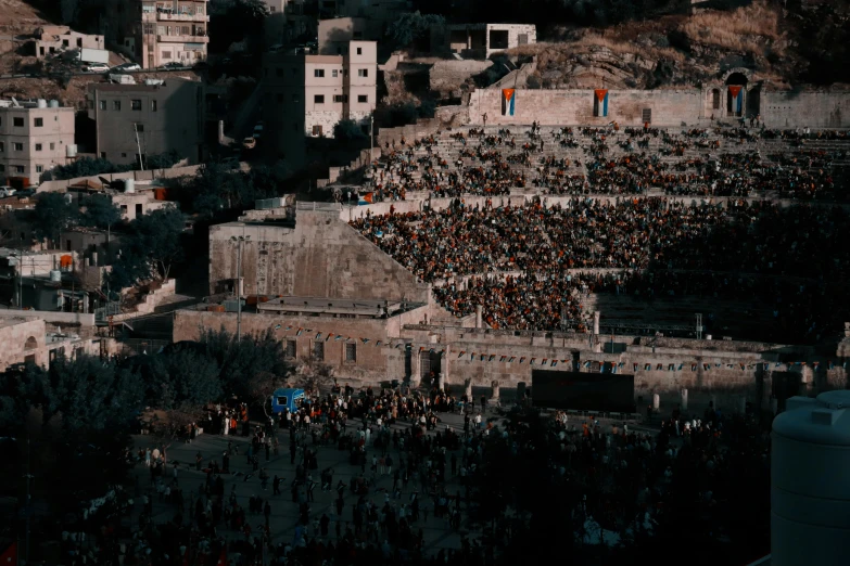 an aerial view of many people gathered at a concert