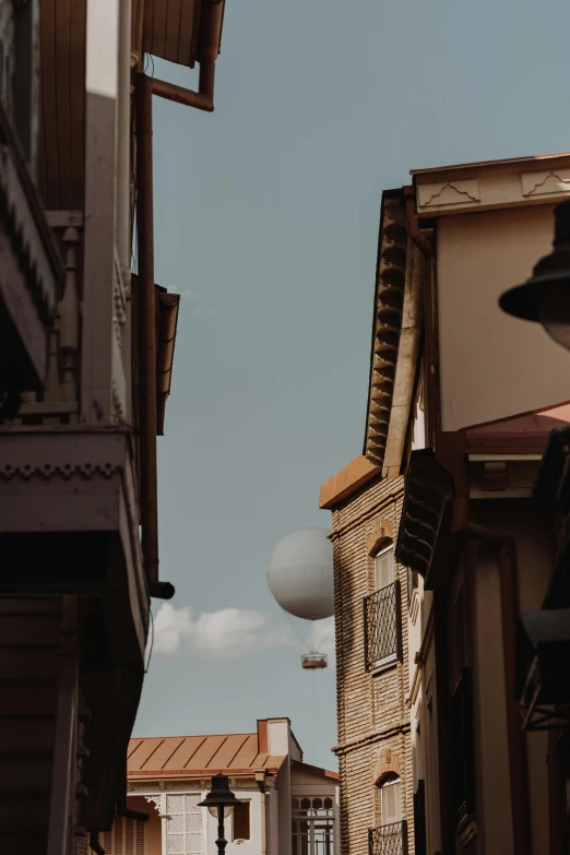 street lights on the side of buildings in an area