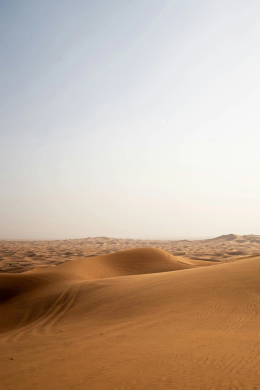 a sandy area in the desert with some sand on it