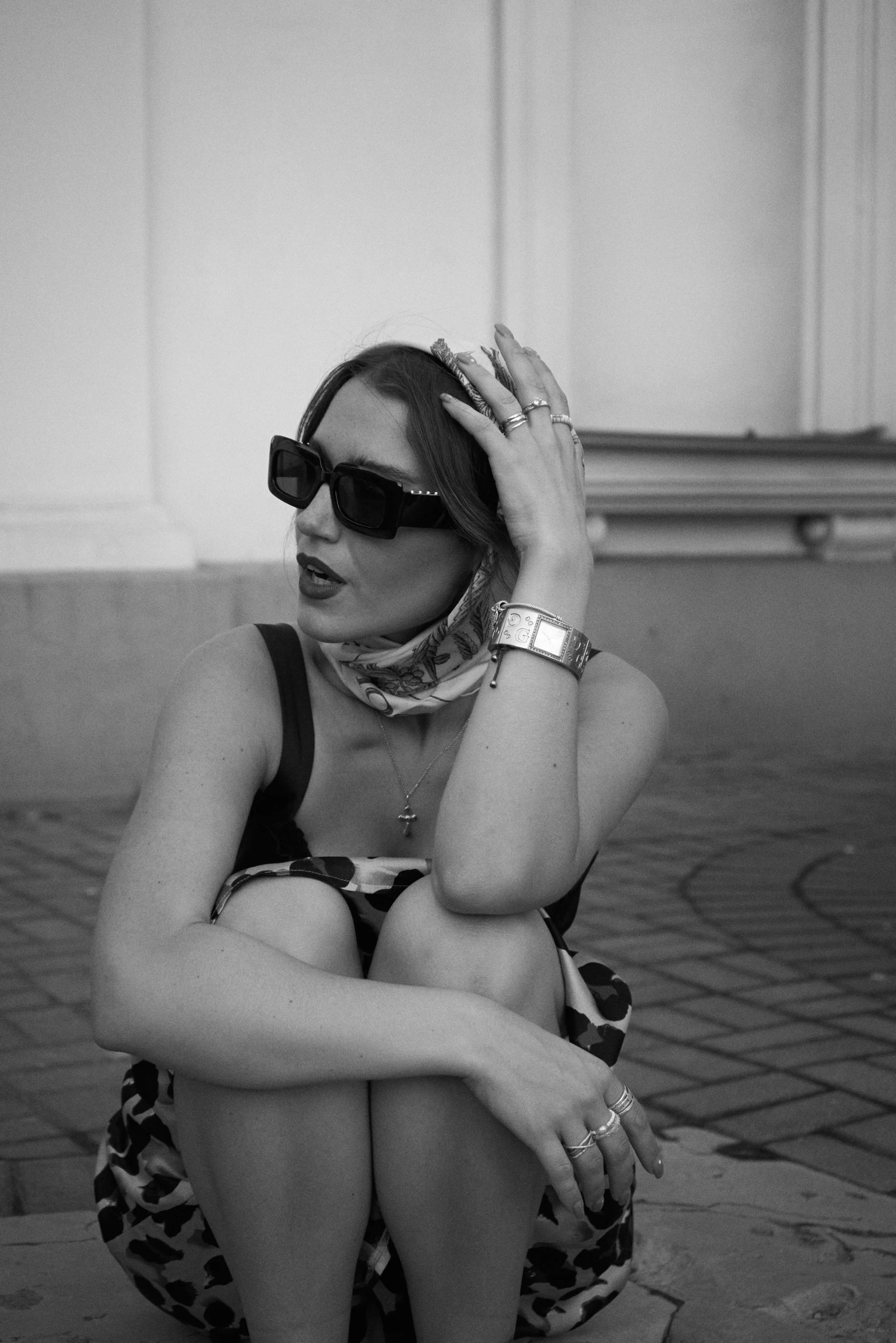 black and white pograph of a woman in sunglasses