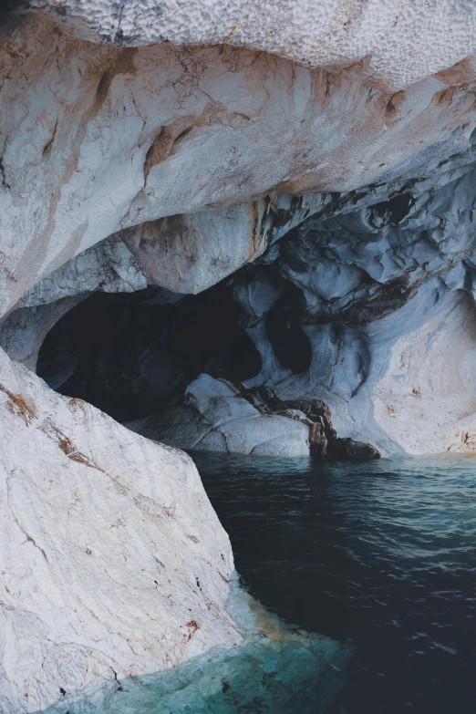 a body of water surrounded by lots of rocks