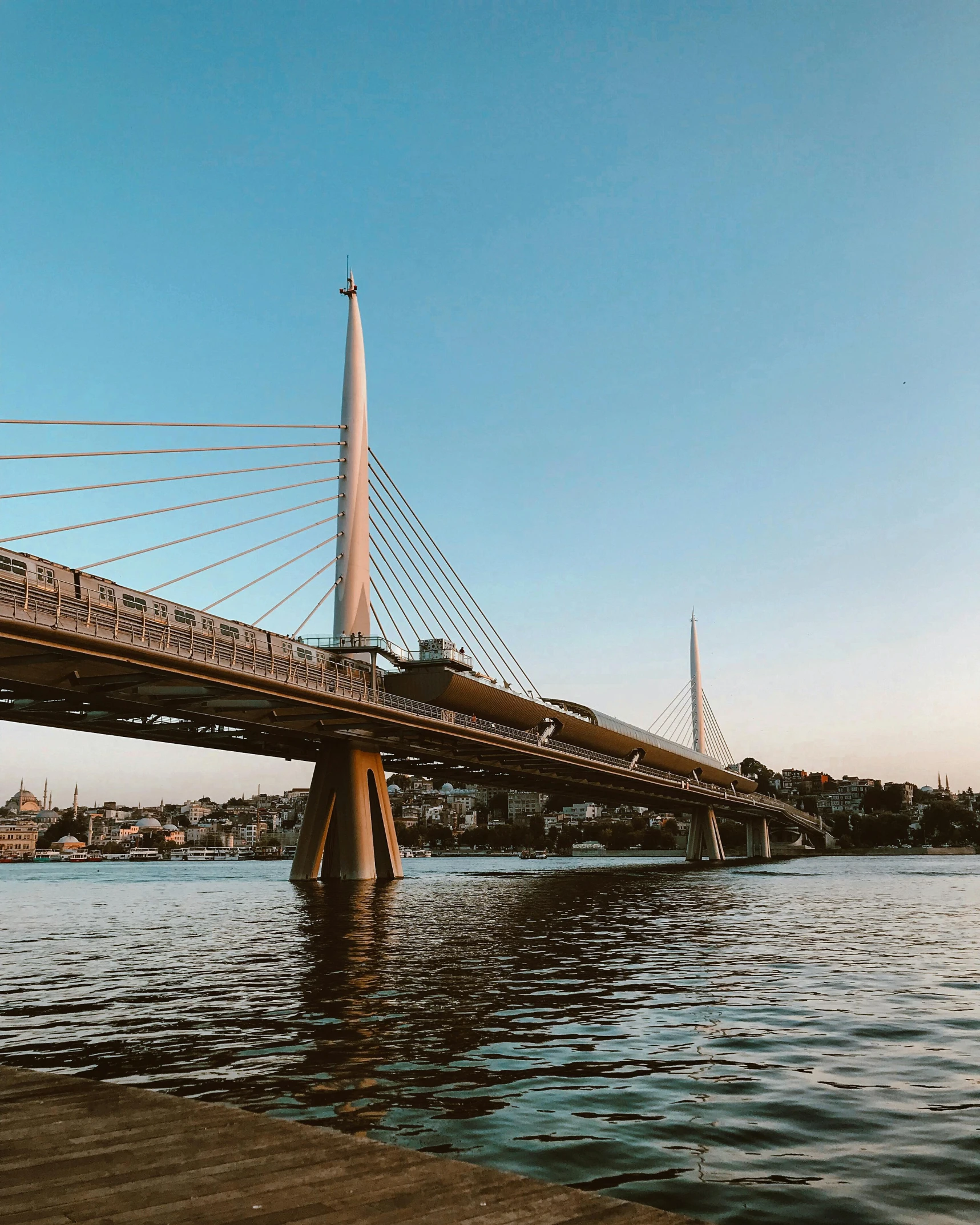 a picture of a large bridge and some water