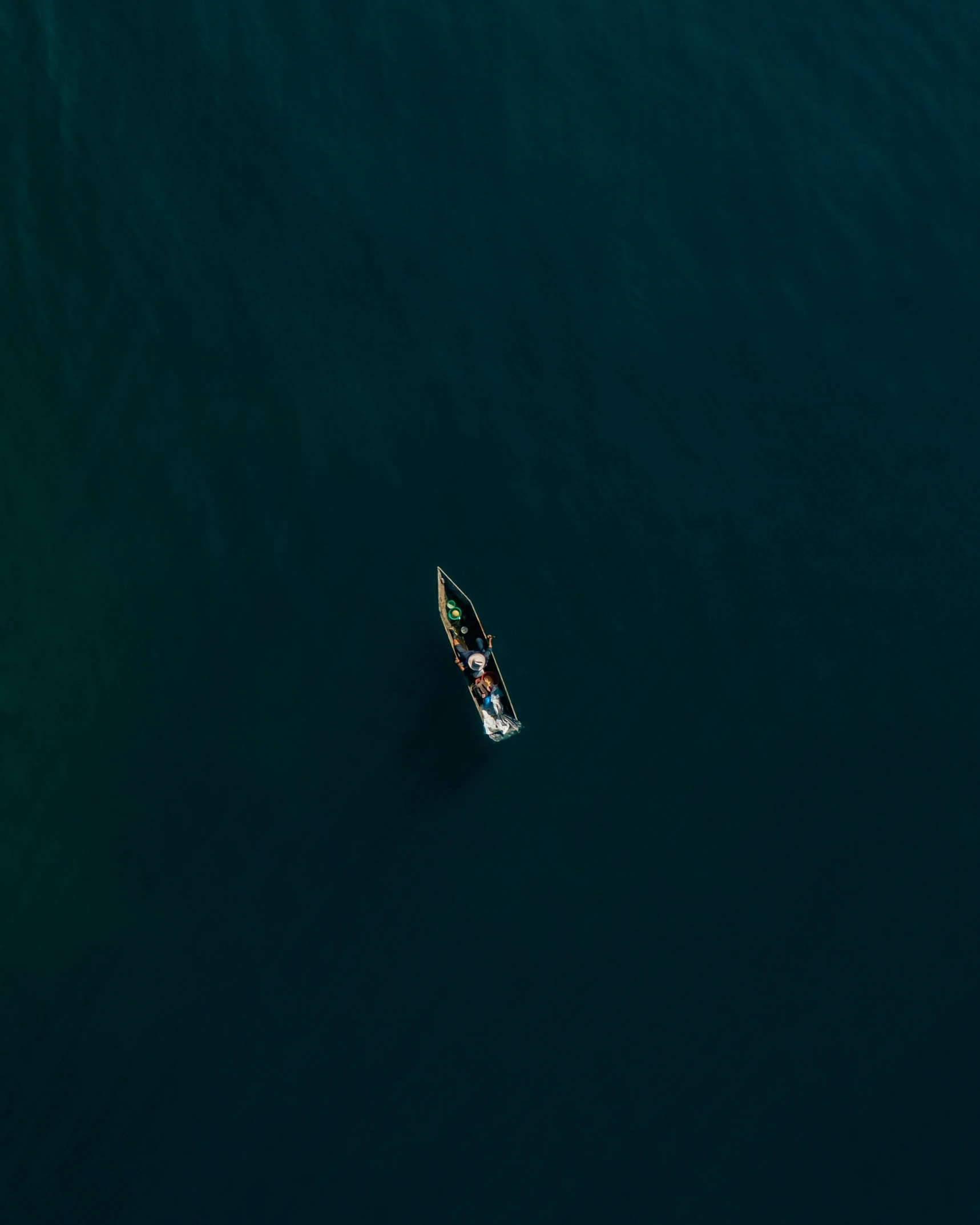 a sailboat is floating across a large body of water