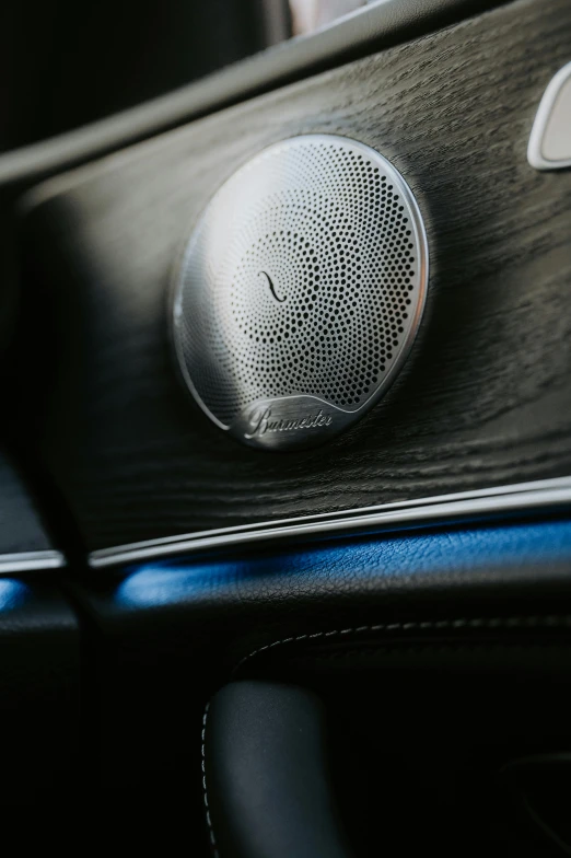 this is a black and grey speaker in someone's car