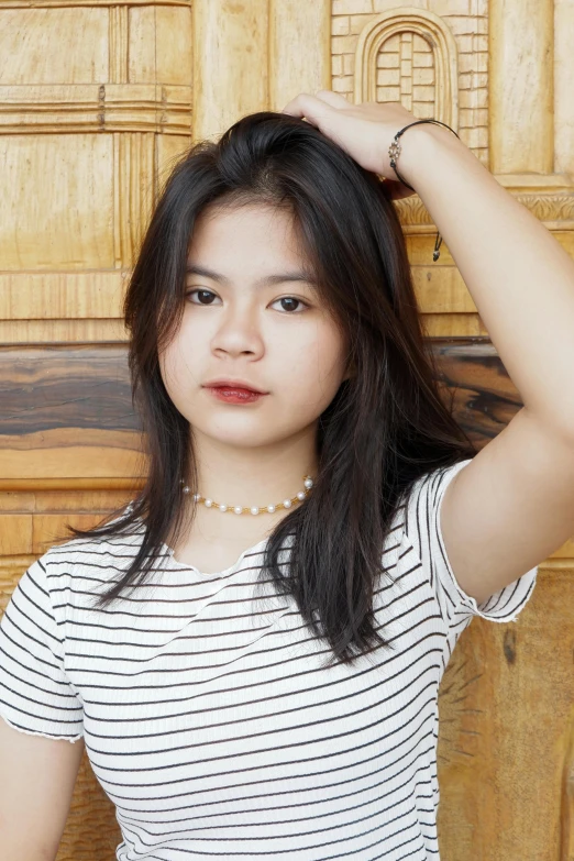 a woman posing with a very beautiful hair