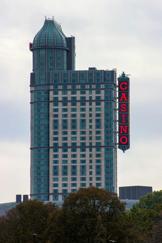 the casino sign is hanging from the building
