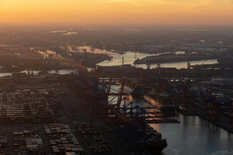 an image of a river going through a city at dusk