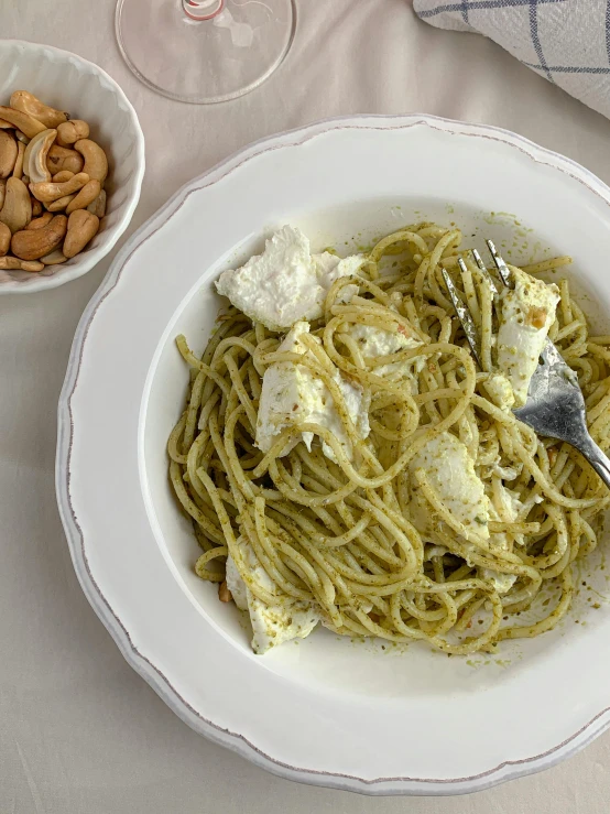 pasta with ricotta cheese, almonds and wine