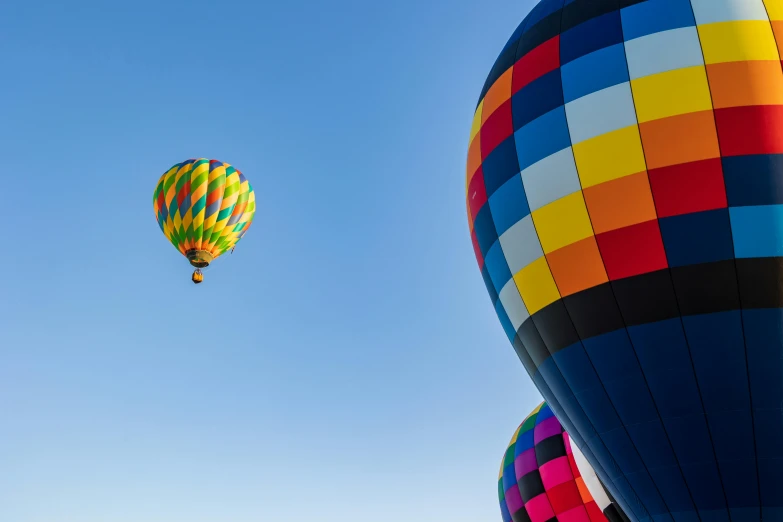 some colorful  air balloons flying in the air