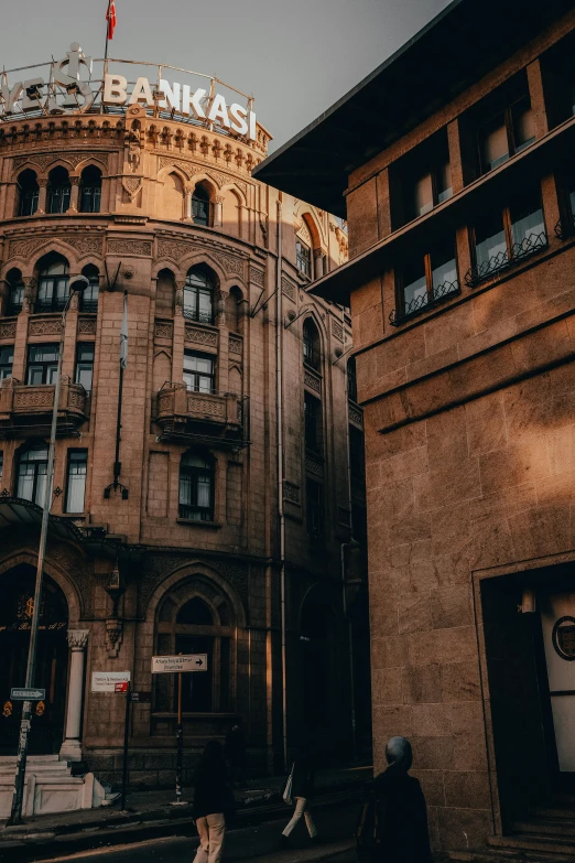 an old building with a tall tower with a clock on it