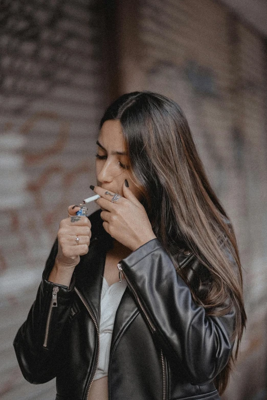 a woman smoking soing with her mouth wide open