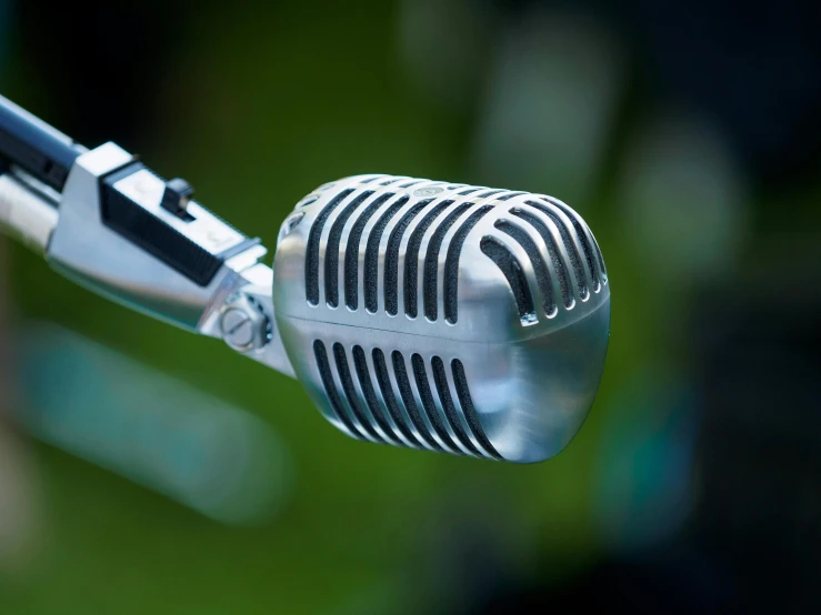 a close up of the handles of an old fashioned microphone