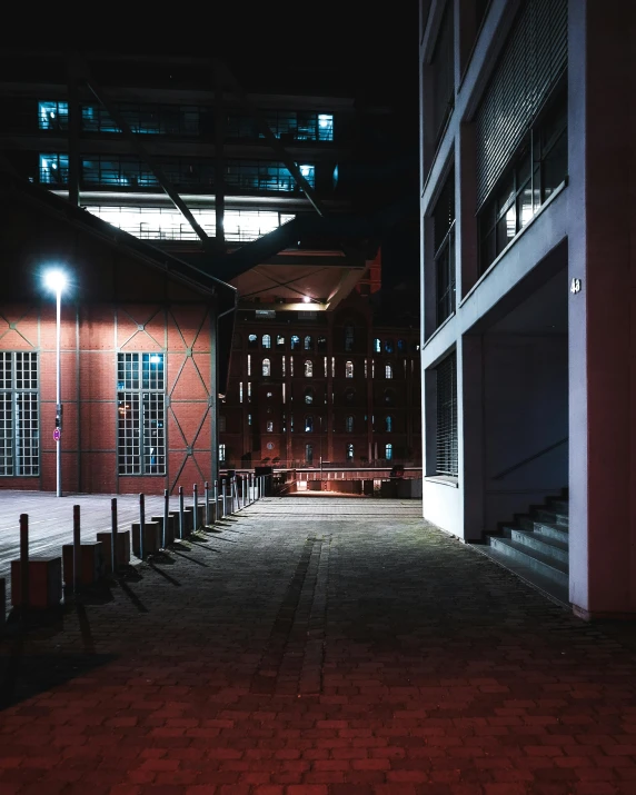 a building is lit up by the street lights