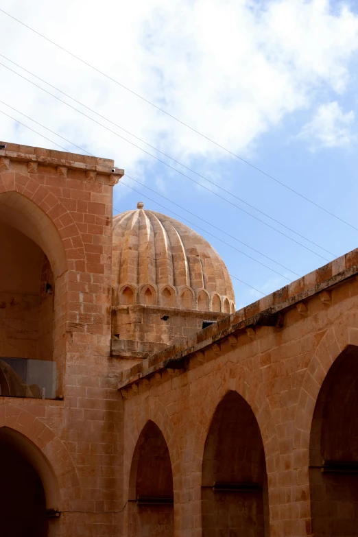 a dome sits on top of an old building