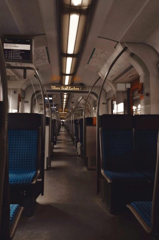 rows of empty train cars lined up on the subway