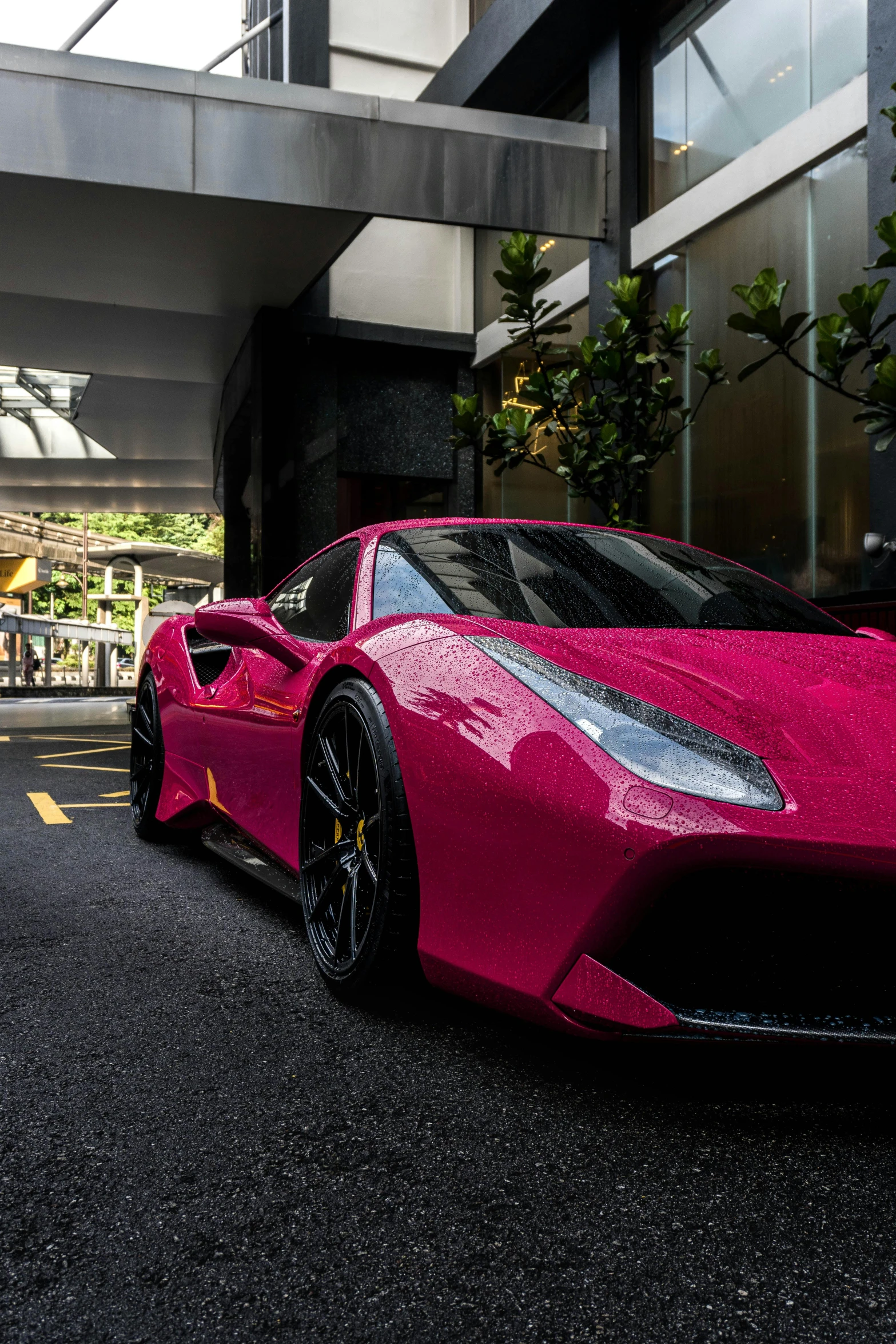 a very nice looking car with pink paint