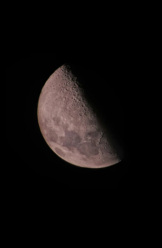 the moon has a large patch of dark cloud covering it