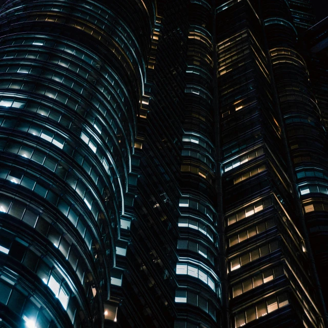 the view of a very tall building at night