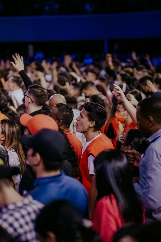 a large group of people are standing together