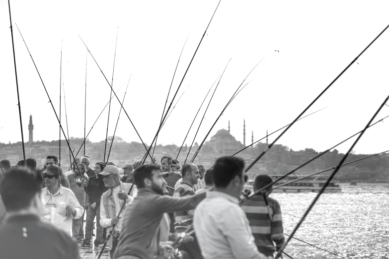 a group of people standing on top of water