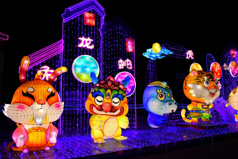 several different types of animal shaped illuminated decorations