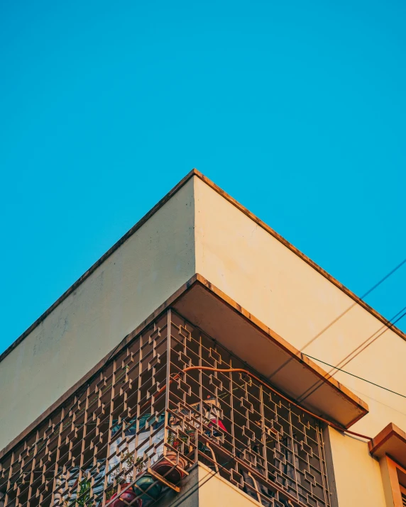 a building with a window and a clock on the top