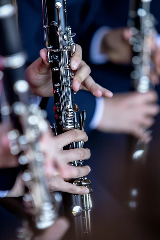 the hands of two musicians performing music together