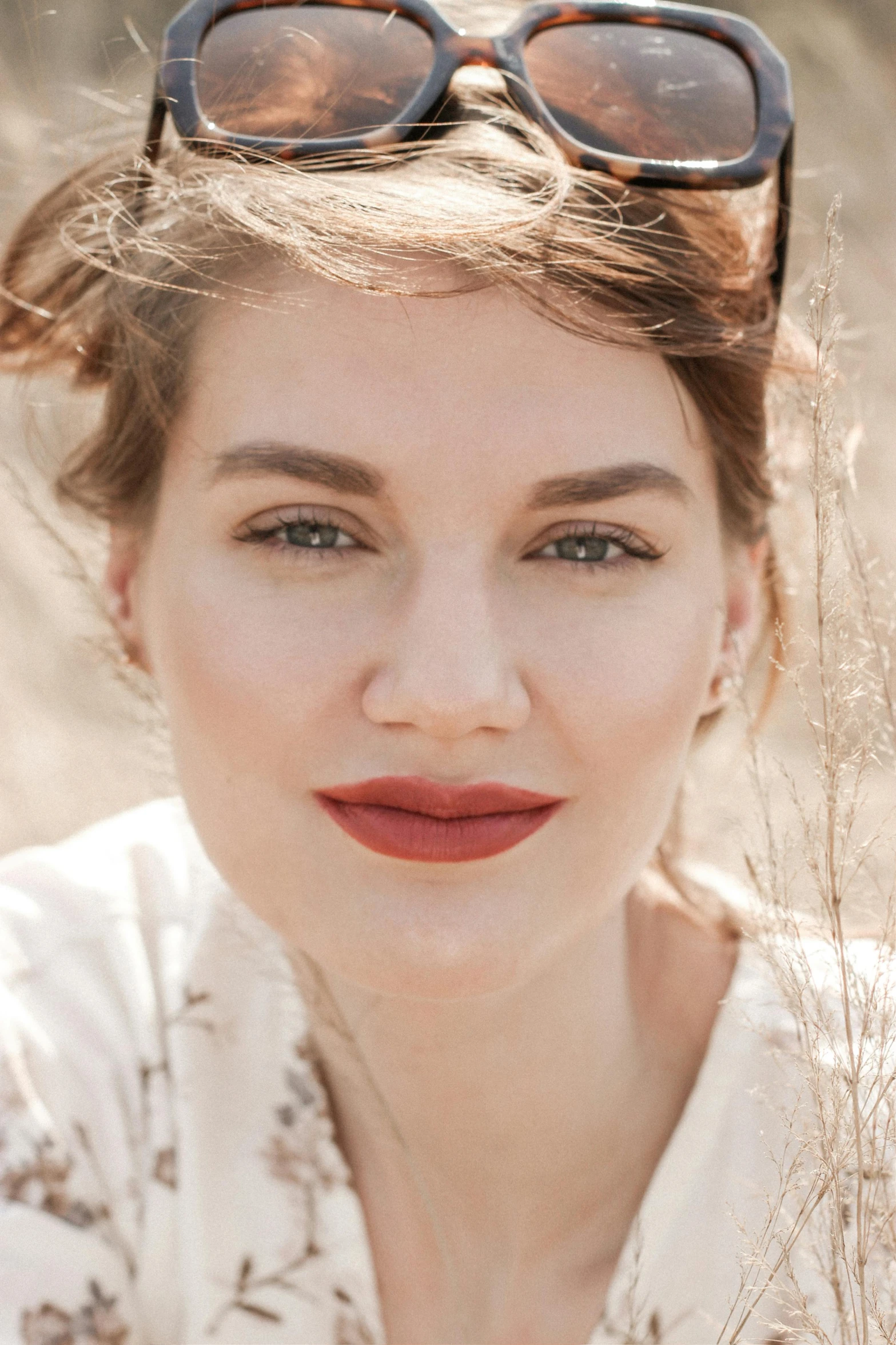 a close up of a person wearing sunglasses