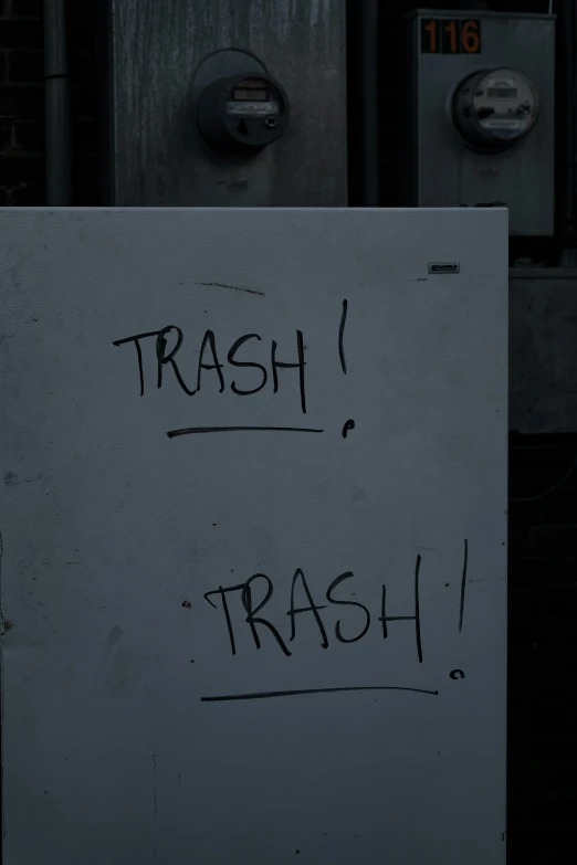 a sign that says trash, trash and i'm not here
