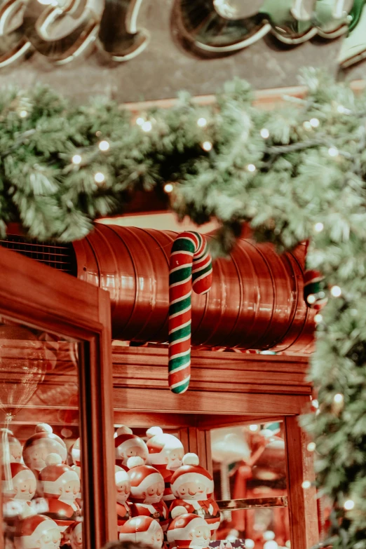 a close up of a display case with candy canes