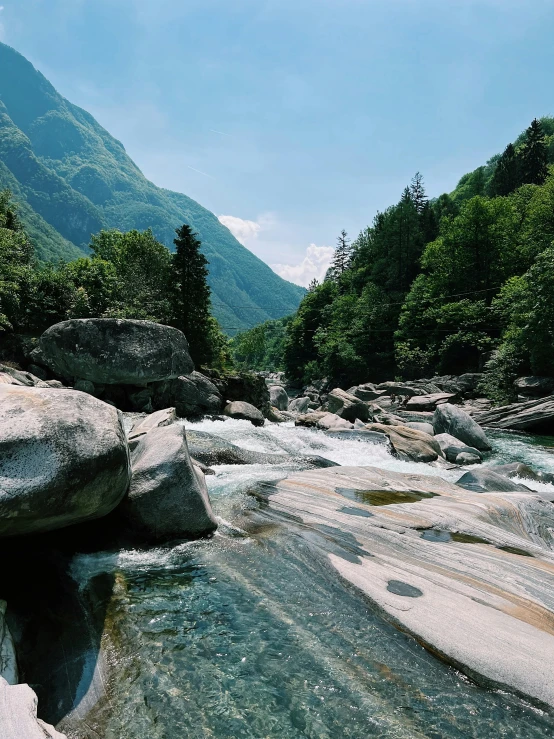 a couple of rocks and some water in the middle