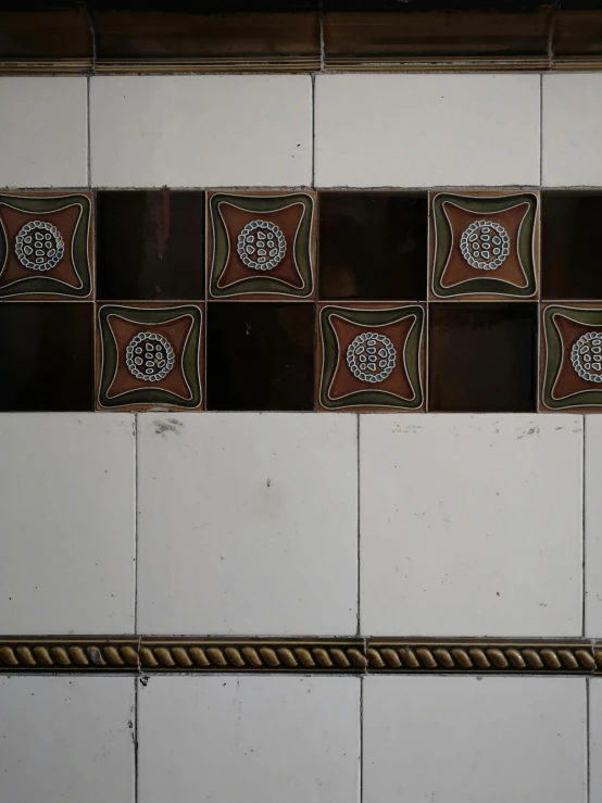 this is some brown and white tiles in a room