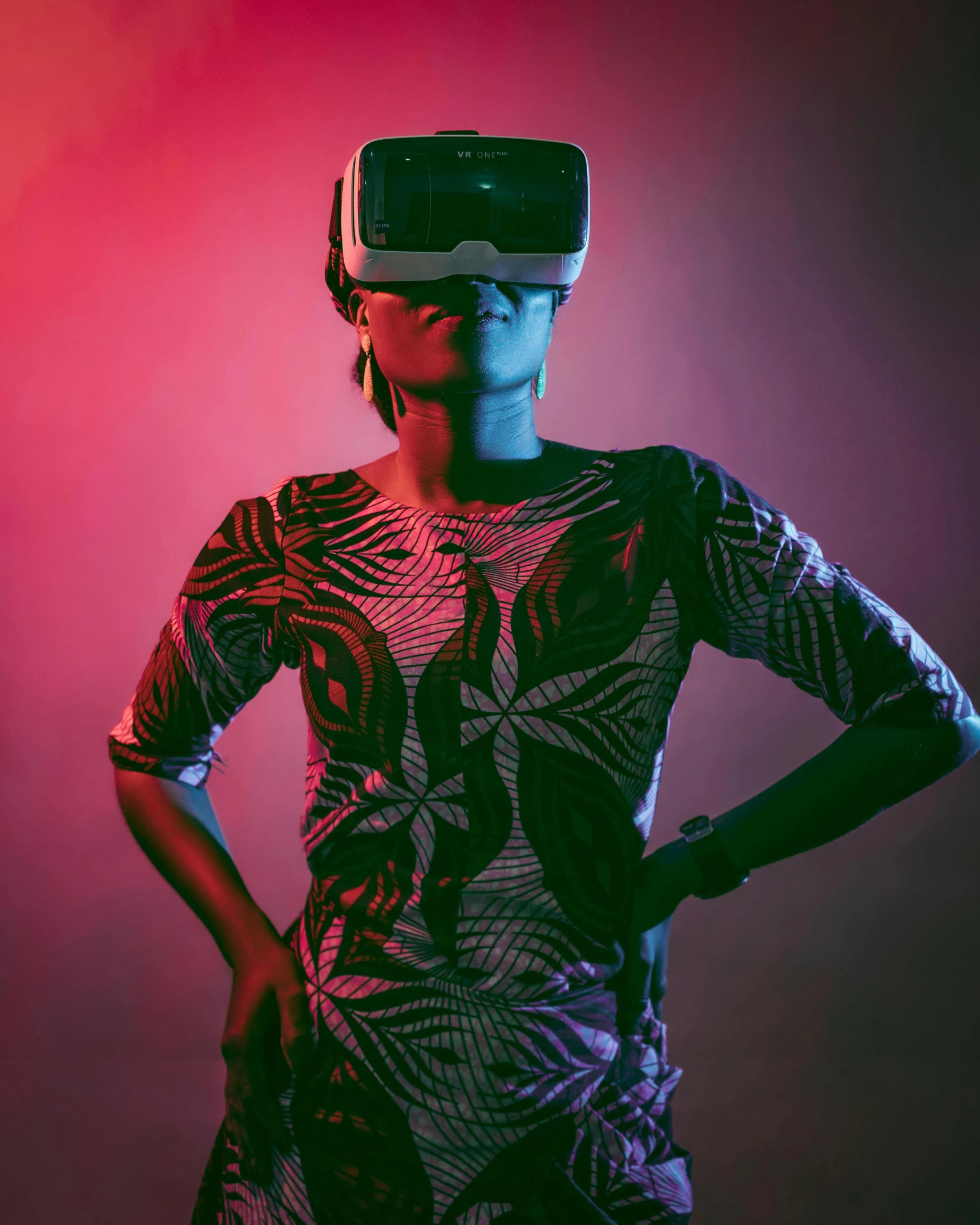 a woman stands with her hands on her hips wearing a virtual glasses