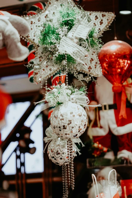 a bunch of white balls hanging from a rack