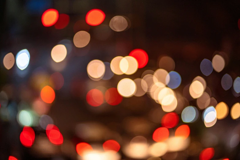 a group of colorful lights on the road