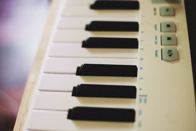 closeup of a musical keyboard with two keys