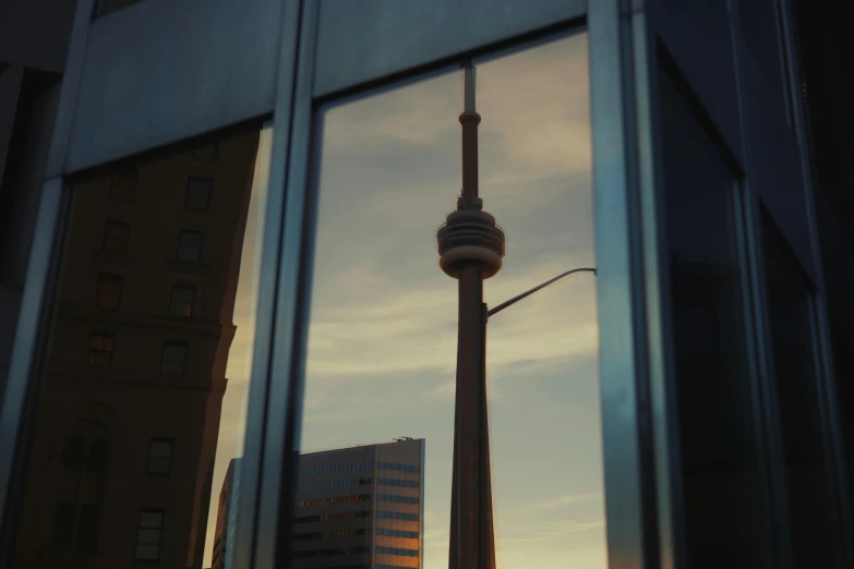 a view of a tower through the window