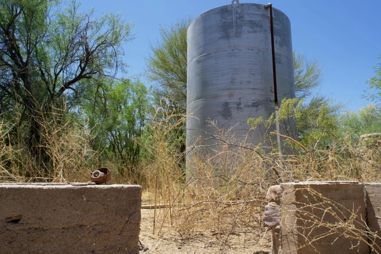 a large tower in the middle of a field