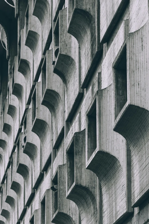 a series of architectural forms in a brick wall