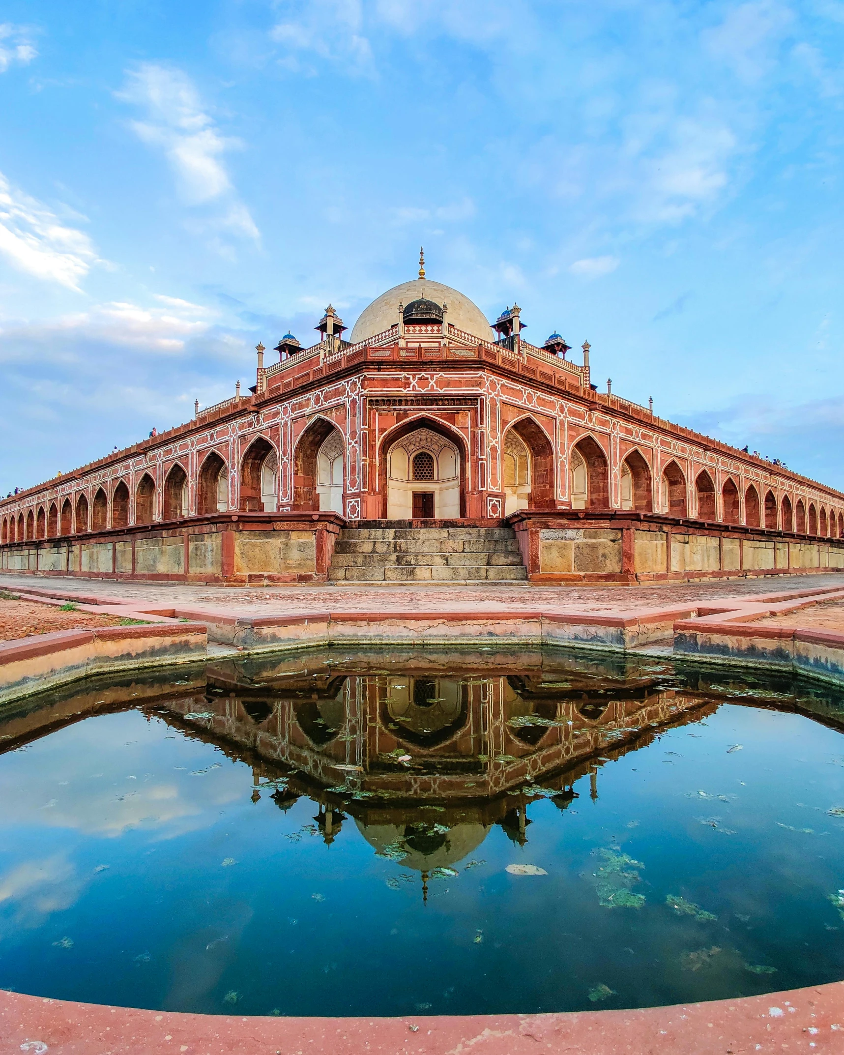 the dome is reflecting in the water outside