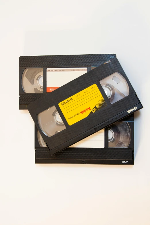 a pair of vhs discs are on the table