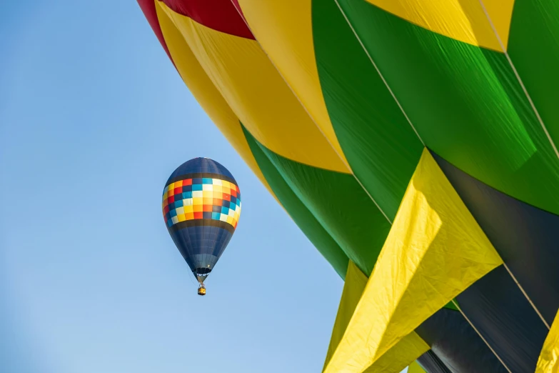  air balloons being flown in the sky